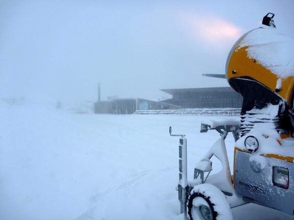 Snow gun blasting near the Coronet Peak base building.